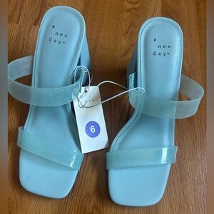 A New Day Blue Heels with Modern Minimalist Design block style heel clear straps